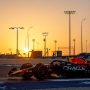Formula 1 car on track at sunset
