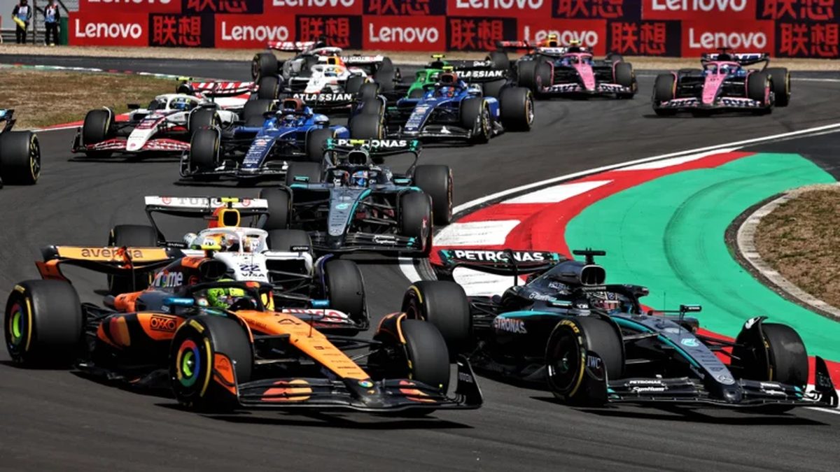 Formula 1 cars racing wheel to wheel